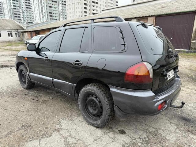 Черный Хендай Санта Фе, объемом двигателя 2 л и пробегом 278 тыс. км за 2500 $, фото 2 на Automoto.ua