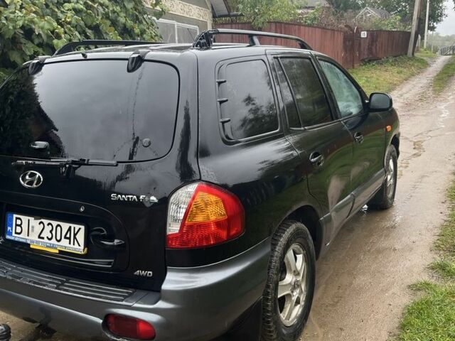 Чорний Хендай Санта Фе, об'ємом двигуна 2 л та пробігом 271 тис. км за 3400 $, фото 5 на Automoto.ua