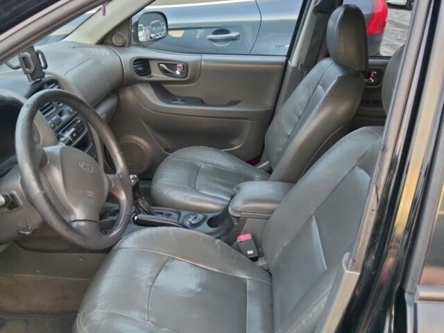 Черный Хендай Санта Фе, объемом двигателя 2.4 л и пробегом 240 тыс. км за 4400 $, фото 11 на Automoto.ua