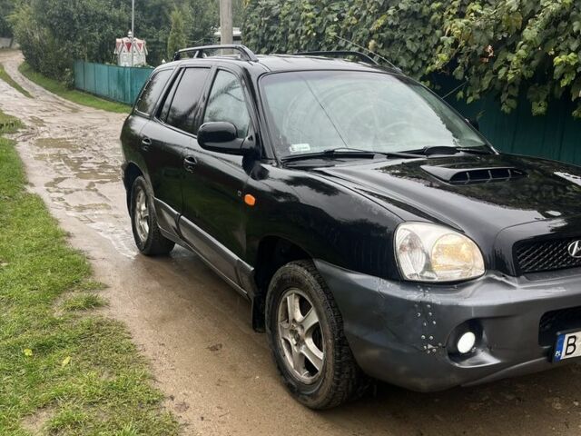 Чорний Хендай Санта Фе, об'ємом двигуна 2 л та пробігом 271 тис. км за 3400 $, фото 2 на Automoto.ua