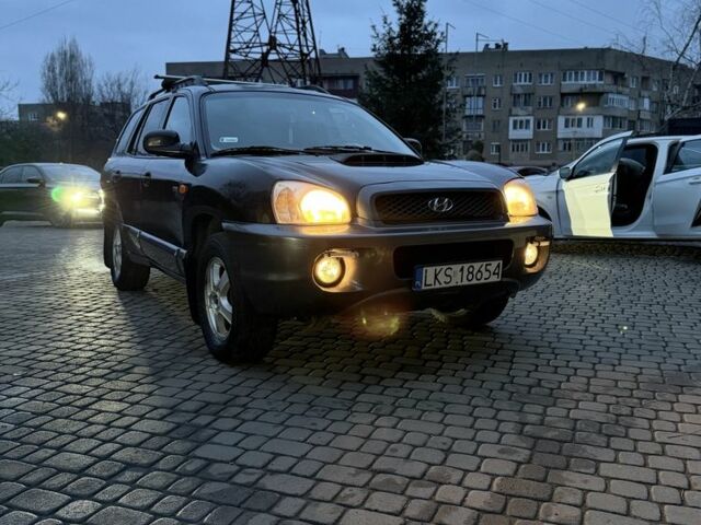 Черный Хендай Санта Фе, объемом двигателя 2 л и пробегом 340 тыс. км за 3500 $, фото 4 на Automoto.ua