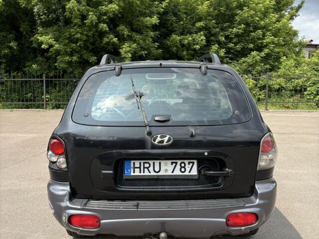 Хендай Санта Фе 2003 в Чернигове на Automoto.ua Черный Хендай Санта Фе, объемом двигателя 2.7 л и пробегом 300 тыс. км за 2500 $, фото 4 на Automoto.ua