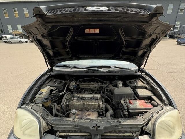 Черный Хендай Санта Фе, объемом двигателя 2.7 л и пробегом 300 тыс. км за 2300 $, фото 6 на Automoto.ua