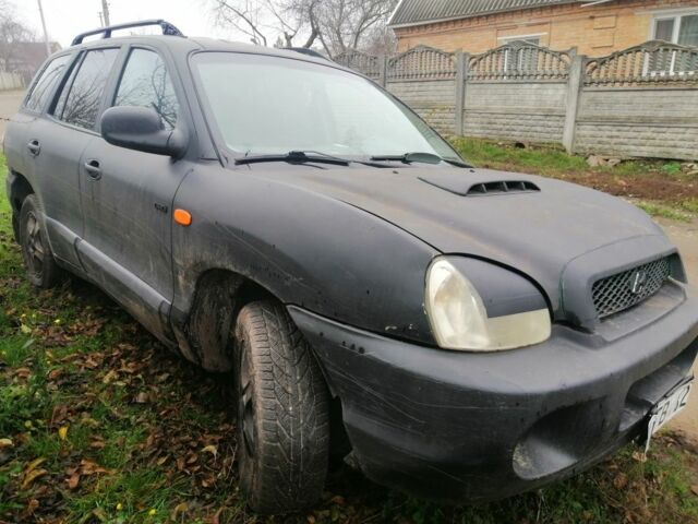 Черный Хендай Санта Фе, объемом двигателя 2 л и пробегом 220 тыс. км за 2700 $, фото 2 на Automoto.ua