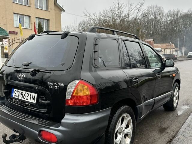 Чорний Хендай Санта Фе, об'ємом двигуна 2 л та пробігом 300 тис. км за 2700 $, фото 2 на Automoto.ua