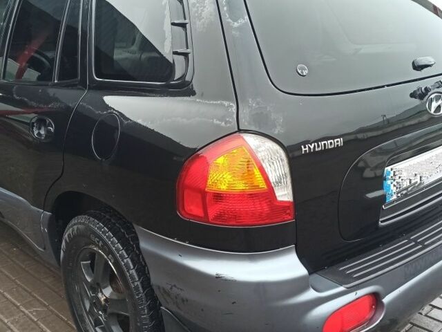 Чорний Хендай Санта Фе, об'ємом двигуна 2 л та пробігом 345 тис. км за 2700 $, фото 4 на Automoto.ua