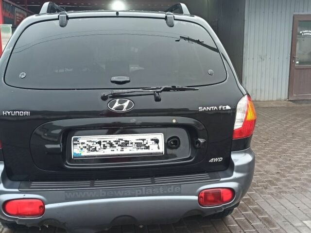 Чорний Хендай Санта Фе, об'ємом двигуна 2 л та пробігом 345 тис. км за 2700 $, фото 3 на Automoto.ua