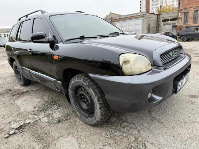 Черный Хендай Санта Фе, объемом двигателя 2 л и пробегом 278 тыс. км за 2500 $, фото 3 на Automoto.ua