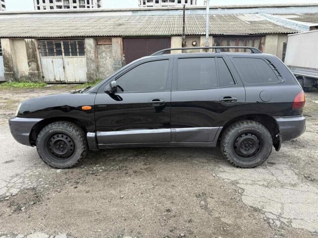 Черный Хендай Санта Фе, объемом двигателя 2 л и пробегом 278 тыс. км за 2500 $, фото 1 на Automoto.ua
