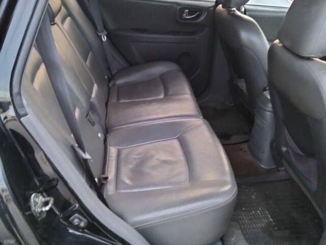 Черный Хендай Санта Фе, объемом двигателя 2.4 л и пробегом 240 тыс. км за 4400 $, фото 6 на Automoto.ua