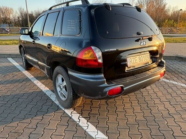 Черный Хендай Санта Фе, объемом двигателя 0 л и пробегом 239 тыс. км за 2800 $, фото 2 на Automoto.ua
