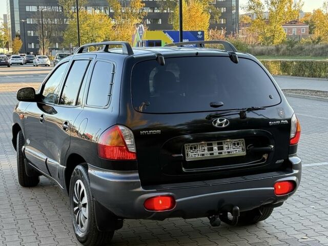 Черный Хендай Санта Фе, объемом двигателя 0 л и пробегом 190 тыс. км за 3800 $, фото 1 на Automoto.ua