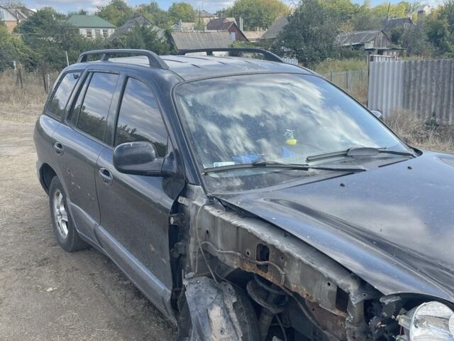 Черный Хендай Санта Фе, объемом двигателя 2.7 л и пробегом 150 тыс. км за 1500 $, фото 3 на Automoto.ua