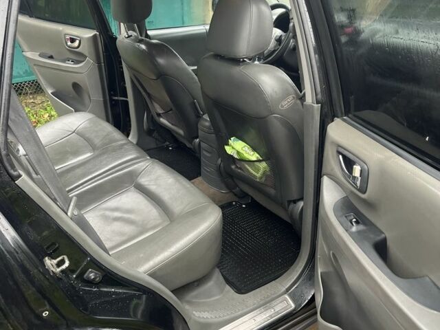 Чорний Хендай Санта Фе, об'ємом двигуна 2 л та пробігом 271 тис. км за 3000 $, фото 11 на Automoto.ua