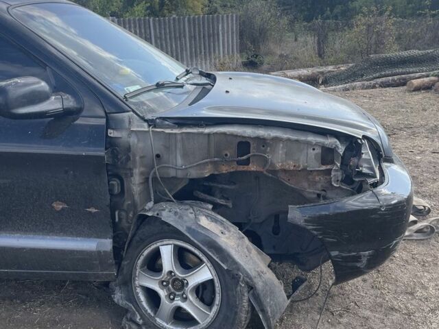 Черный Хендай Санта Фе, объемом двигателя 2.7 л и пробегом 150 тыс. км за 1500 $, фото 2 на Automoto.ua