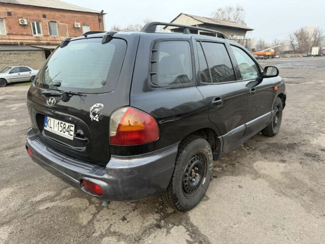 Черный Хендай Санта Фе, объемом двигателя 2 л и пробегом 283 тыс. км за 3300 $, фото 1 на Automoto.ua