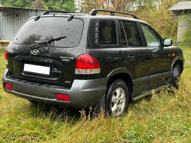 Черный Хендай Санта Фе, объемом двигателя 2 л и пробегом 273 тыс. км за 3800 $, фото 3 на Automoto.ua