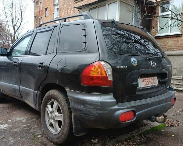 Черный Хендай Санта Фе, объемом двигателя 2.2 л и пробегом 230 тыс. км за 4800 $, фото 3 на Automoto.ua