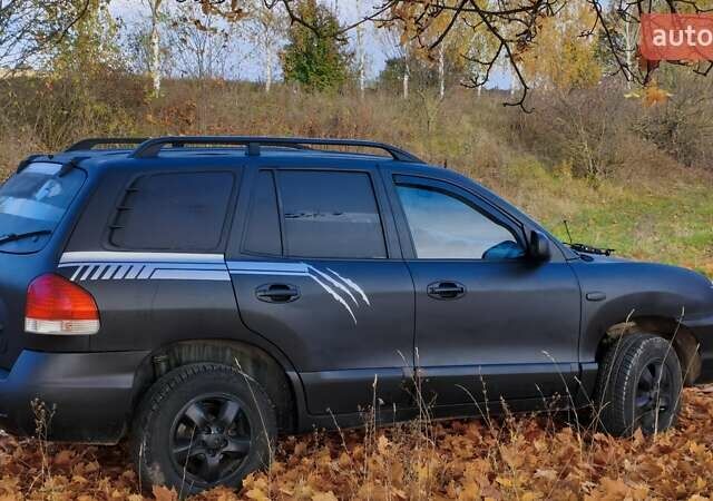 Чорний Хендай Санта Фе, об'ємом двигуна 2 л та пробігом 306 тис. км за 4199 $, фото 8 на Automoto.ua