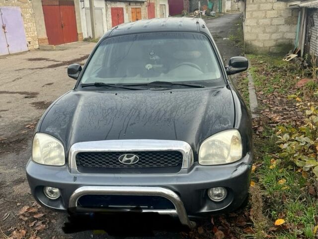 Черный Хендай Санта Фе, объемом двигателя 2.4 л и пробегом 240 тыс. км за 1900 $, фото 3 на Automoto.ua