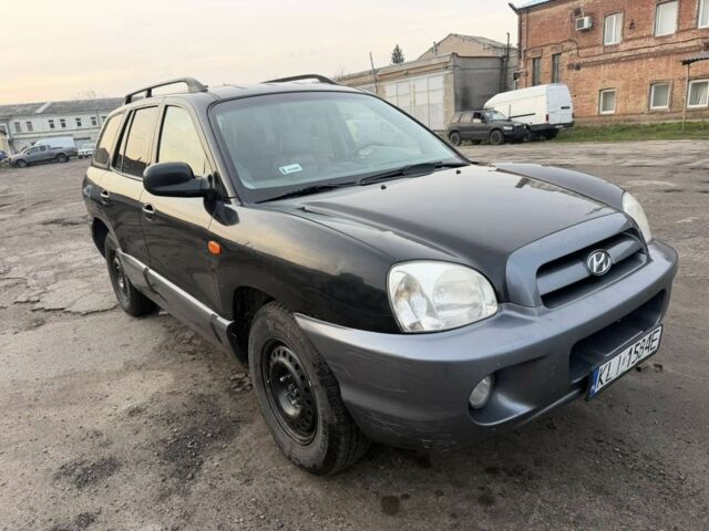 Черный Хендай Санта Фе, объемом двигателя 2 л и пробегом 283 тыс. км за 3300 $, фото 3 на Automoto.ua