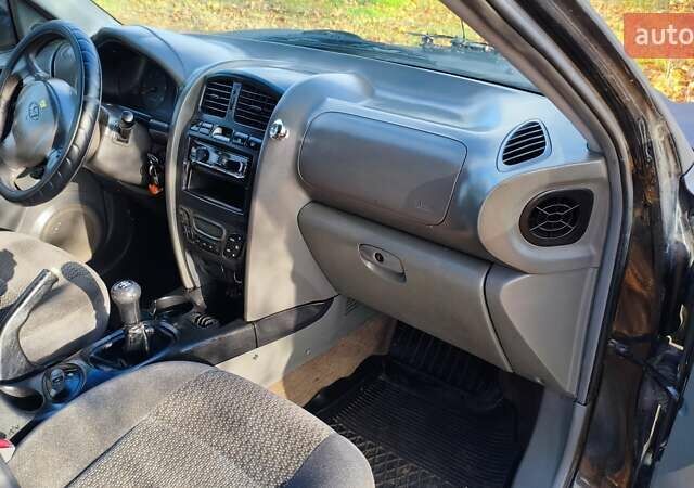 Чорний Хендай Санта Фе, об'ємом двигуна 2 л та пробігом 306 тис. км за 4199 $, фото 14 на Automoto.ua