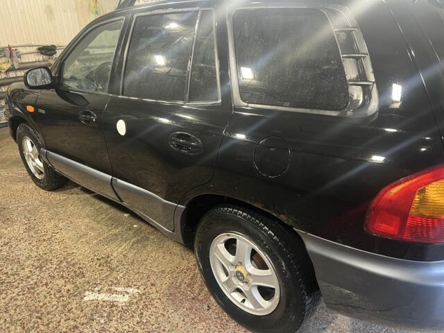 Чорний Хендай Санта Фе, об'ємом двигуна 2 л та пробігом 383 тис. км за 3300 $, фото 1 на Automoto.ua