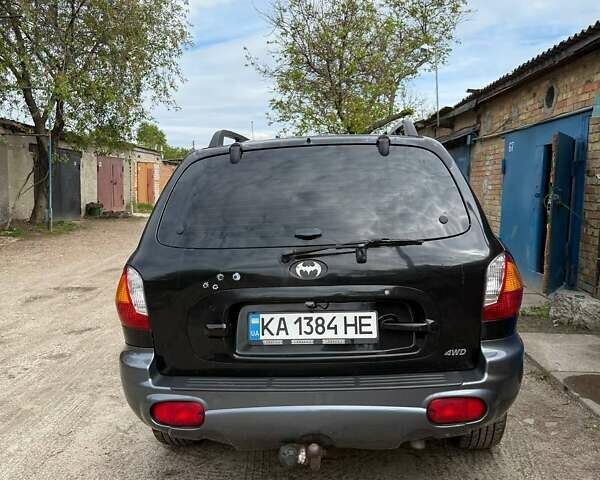 Чорний Хендай Санта Фе, об'ємом двигуна 1.99 л та пробігом 240 тис. км за 7100 $, фото 4 на Automoto.ua