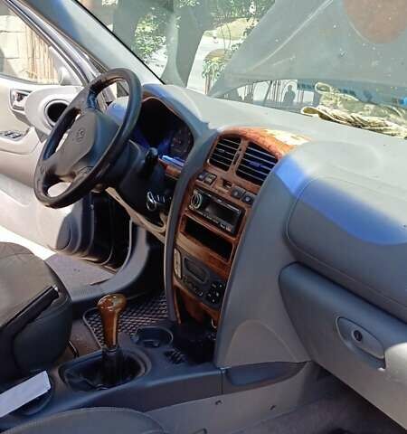 Черный Хендай Санта Фе, объемом двигателя 2.2 л и пробегом 230 тыс. км за 4800 $, фото 5 на Automoto.ua