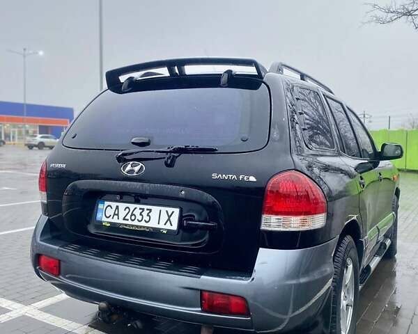 Чорний Хендай Санта Фе, об'ємом двигуна 1.99 л та пробігом 360 тис. км за 6400 $, фото 17 на Automoto.ua