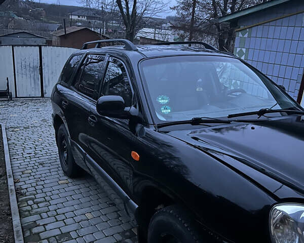 Чорний Хендай Санта Фе, об'ємом двигуна 2.35 л та пробігом 189 тис. км за 6499 $, фото 2 на Automoto.ua