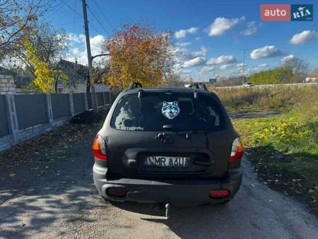 Чорний Хендай Санта Фе, об'ємом двигуна 2 л та пробігом 385 тис. км за 3000 $, фото 3 на Automoto.ua