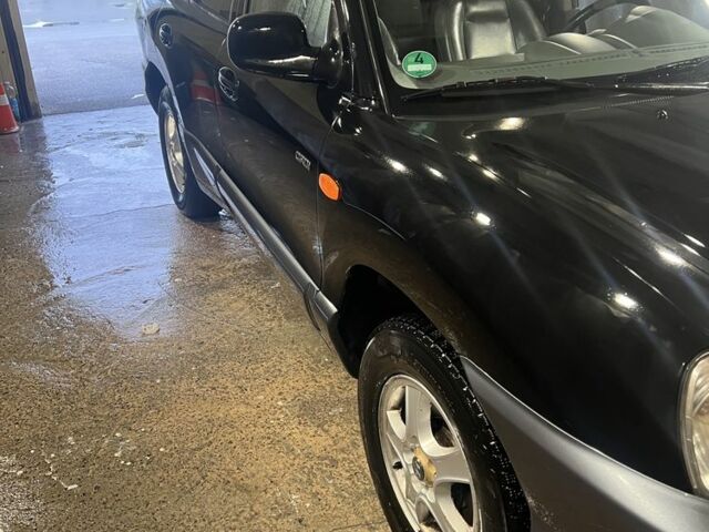 Чорний Хендай Санта Фе, об'ємом двигуна 2 л та пробігом 383 тис. км за 3300 $, фото 3 на Automoto.ua