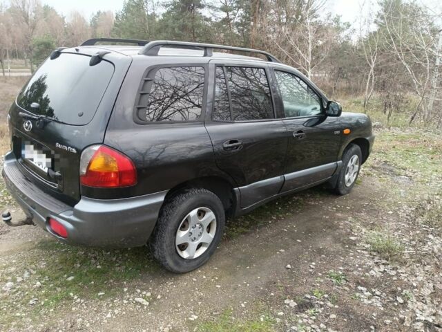 Чорний Хендай Санта Фе, об'ємом двигуна 2 л та пробігом 258 тис. км за 3000 $, фото 3 на Automoto.ua