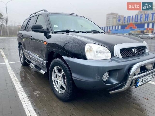 Чорний Хендай Санта Фе, об'ємом двигуна 1.99 л та пробігом 360 тис. км за 6400 $, фото 3 на Automoto.ua