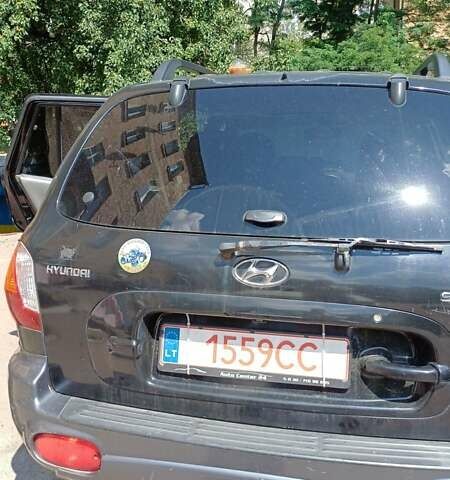 Черный Хендай Санта Фе, объемом двигателя 2.2 л и пробегом 230 тыс. км за 4800 $, фото 4 на Automoto.ua