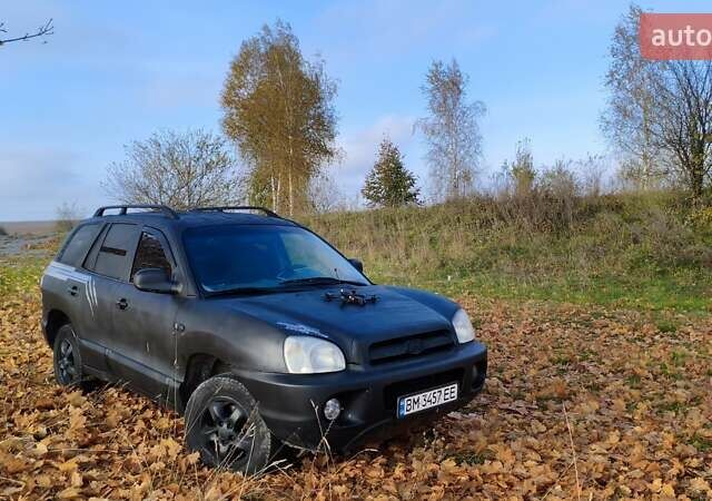 Чорний Хендай Санта Фе, об'ємом двигуна 2 л та пробігом 306 тис. км за 4199 $, фото 3 на Automoto.ua