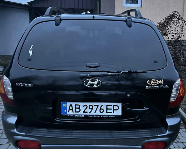 Чорний Хендай Санта Фе, об'ємом двигуна 2.35 л та пробігом 189 тис. км за 6499 $, фото 6 на Automoto.ua