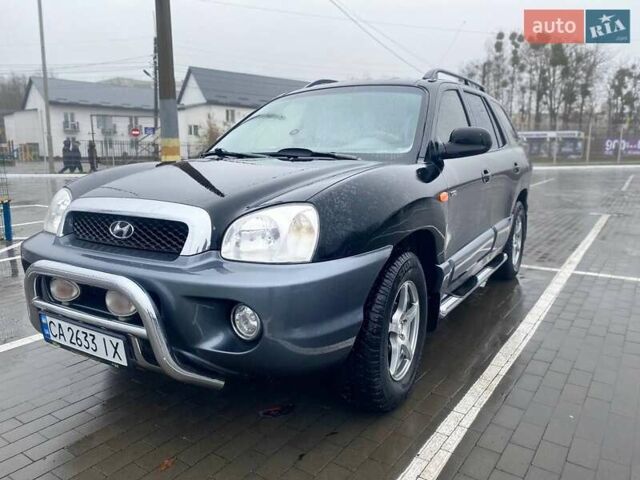 Чорний Хендай Санта Фе, об'ємом двигуна 1.99 л та пробігом 360 тис. км за 6400 $, фото 16 на Automoto.ua
