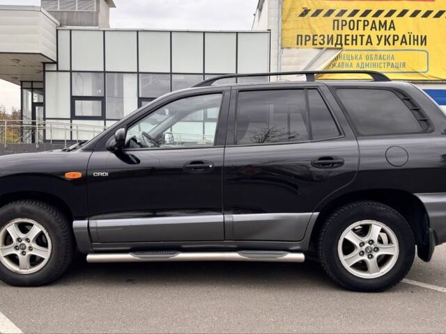 Черный Хендай Санта Фе, объемом двигателя 0 л и пробегом 300 тыс. км за 4077 $, фото 1 на Automoto.ua