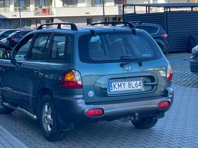 Чорний Хендай Санта Фе, об'ємом двигуна 2 л та пробігом 260 тис. км за 3019 $, фото 4 на Automoto.ua