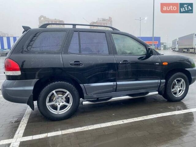 Чорний Хендай Санта Фе, об'ємом двигуна 1.99 л та пробігом 360 тис. км за 6400 $, фото 4 на Automoto.ua