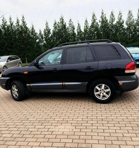 Черный Хендай Санта Фе, объемом двигателя 2.2 л и пробегом 244 тыс. км за 2200 $, фото 5 на Automoto.ua