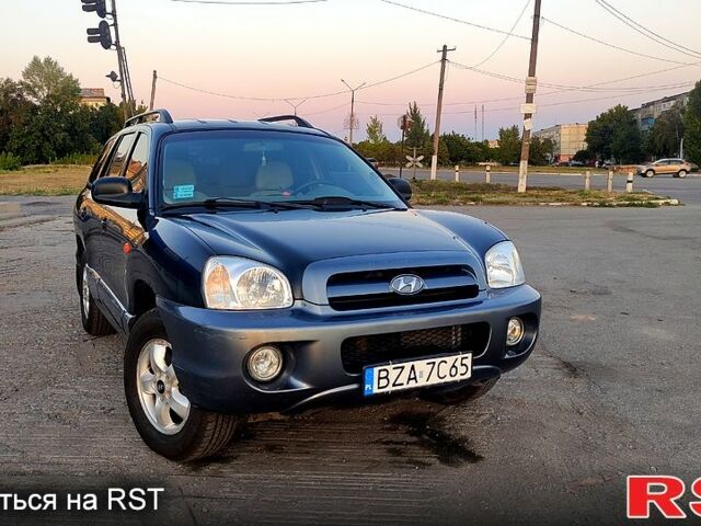 Черный Хендай Санта Фе, объемом двигателя 2 л и пробегом 339 тыс. км за 3888 $, фото 4 на Automoto.ua