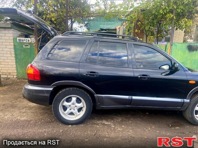 Черный Хендай Санта Фе, объемом двигателя 2 л и пробегом 350 тыс. км за 4200 $, фото 3 на Automoto.ua