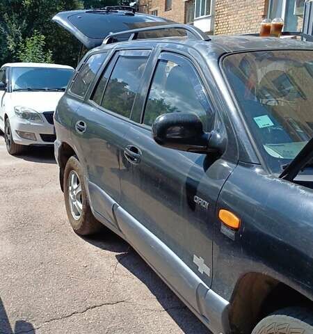 Черный Хендай Санта Фе, объемом двигателя 2.2 л и пробегом 230 тыс. км за 4800 $, фото 2 на Automoto.ua