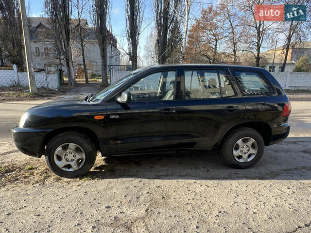 Чорний Хендай Санта Фе, об'ємом двигуна 1.99 л та пробігом 430 тис. км за 3200 $, фото 1 на Automoto.ua