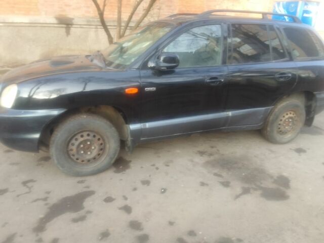 Черный Хендай Санта Фе, объемом двигателя 2 л и пробегом 28 тыс. км за 5500 $, фото 1 на Automoto.ua