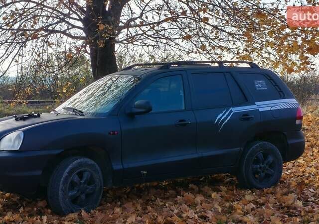 Чорний Хендай Санта Фе, об'ємом двигуна 2 л та пробігом 306 тис. км за 4199 $, фото 5 на Automoto.ua