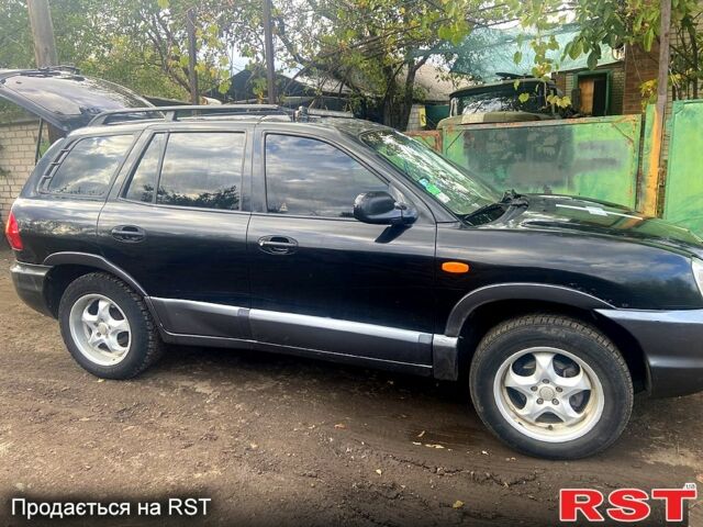 Черный Хендай Санта Фе, объемом двигателя 2 л и пробегом 350 тыс. км за 4200 $, фото 4 на Automoto.ua